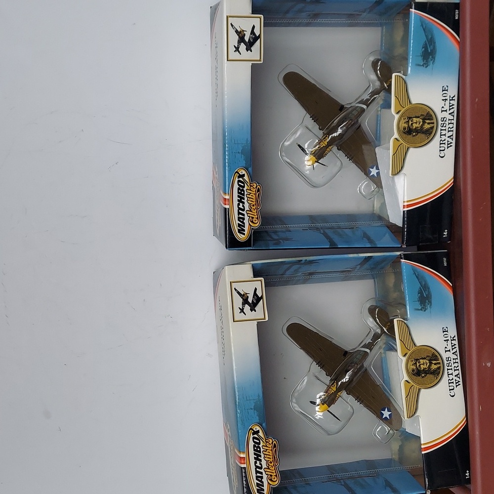 Matchbox  collectibles two Curtis p-40E warhawk airplane .New ,for ages 14 +.